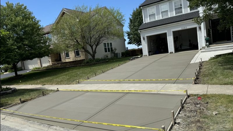 Completed concrete driveway replacement in Naperville, IL